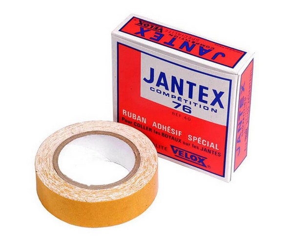 Double-sided adhesive tape for tubular bicycle rims. Strong and durable. One packet fits two wheels. 50g